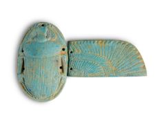 AN ANCIENT EGYPTIAN FAIENCE SCARAB AND WING, LATE PERIOD - PTOLEMAIC PERIOD