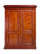 A GEORGE IV FIGURED MAHOGANY WARDROBE, CIRCA 1830