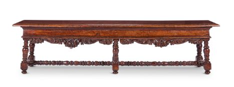 AN BAROQUE WALNUT LONG STOOL OR HALL BENCH, ITALIAN, LATE 17TH CENTURY/EARLY 18TH CENTURY