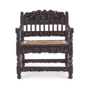 Y AN INDIAN SOLID EBONY ARMCHAIR, COROMANDEL COAST, LATE 17TH CENTURY