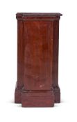 A MAHOGANY BREAKFRONT PEDESTAL, EARLY 19TH CENTURY
