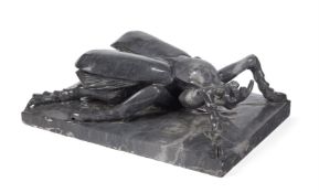 A LARGE BLACK MARBLE MODEL OF A BEETLE ITALIAN