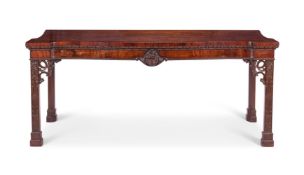 A GEORGE III STYLE MAHOGANY SERPENTINE SIDE TABLE, POSSIBLY IRISH