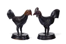 Y A PAIR OF CARVED EBONY MODELS OF A COCKEREL AND A HEN, INDIAN, 19TH CENTURY