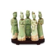 A group of five Chinese green glazed figures
