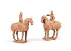 A pair of Chinese pottery models Horses and Riders