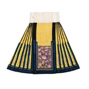 A Chinese Han woman's yellow damask pleated skirt