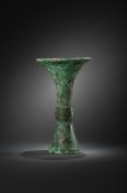 An inscribed Chinese archaic bronze ritual wine vessel