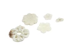 A group of Chinese pale celadon jade and glass carvings