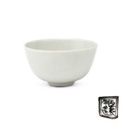 A small Chinese white-glazed tea bowl