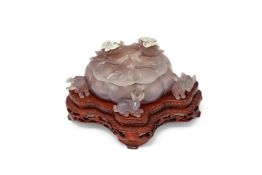 A Chinese carved agate box and cover