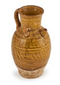 A Chinese straw-glazed pottery ewer