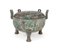 A large Chinese archaic bronze ritual food vessel and cover