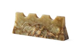 A Chinese celadon jade brush rest