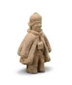 An unusual Chinese pottery figure of a 'foreigner'