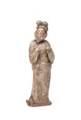 An unusual pottery figure of a court Entertainer