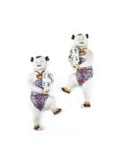 A pair of Chinese Famille Rose wall figures of boys