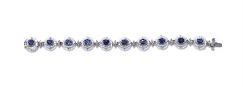 A SAPPHIRE, DIAMOND AND ROCK CRYSTAL BRACELET