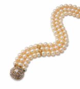 A THREE ROW CULTURED PEARL AND DIAMOND NECKLACE