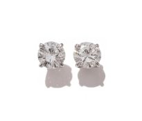 A PAIR OF DIAMOND STUD EARRINGS