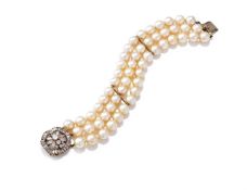A THREE ROW CULTURED PEARL AND DIAMOND BRACELET
