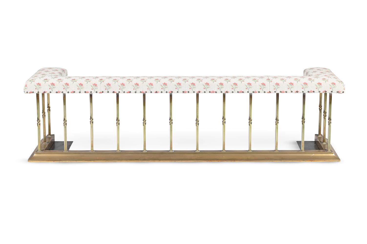 A POLISHED BRASS AND UPHOLSTERED BRASS CLUB FENDER, BY ACRES FARM BERKSHIRE