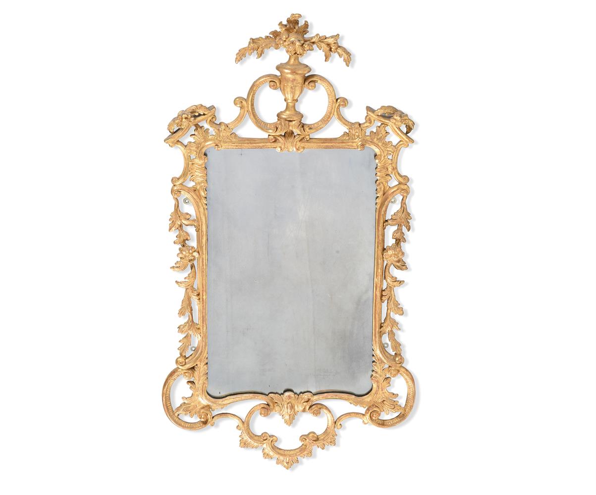 A GEORGE III CARVED GILTWOOD MIRROR, CIRCA 1780