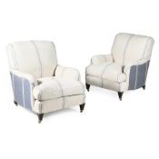 A PAIR OF BEECH AND UPHOLSTERED 'SAVERNAKE' ARMCHAIRS, IN THE MANNER OF HOWARD AND SONS, MODERN