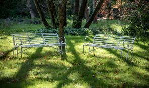 A PAIR OF WHITE PAINTED IRON STRAPWORK BENCHES, IN REGENCY STYLE, 20TH CENTURY