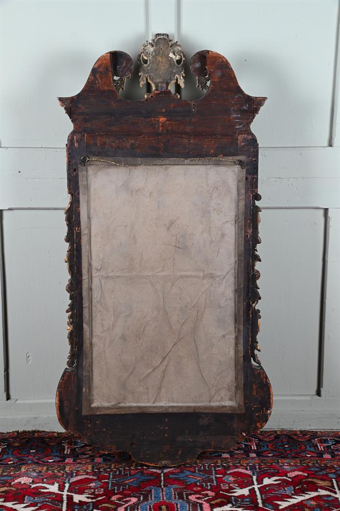 A GEORGE II FIGURED WALNUT AND PARCEL GILT MIRROR, CIRCA 1745 - Image 2 of 2