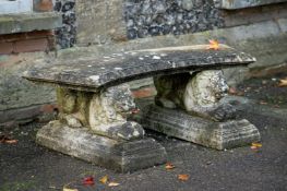 A STONE COMPOSITION SEAT, 20TH CENTURY