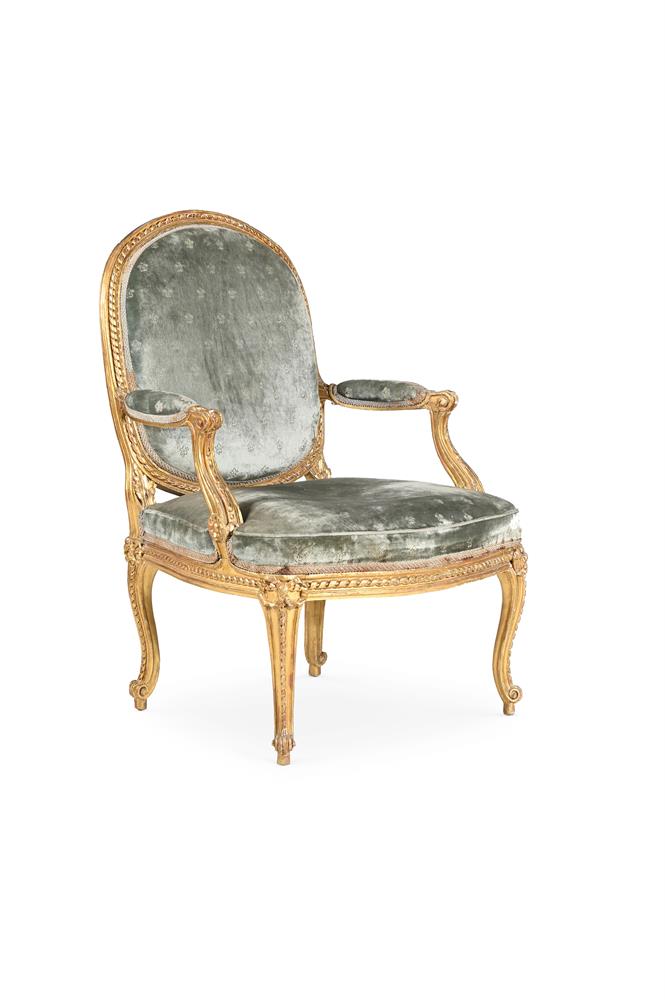 A LOUIS XV CARVED GILTWOOD ARMCHAIR, BY LOUIS-CHARLES CARPENTIER, CIRCA 1765