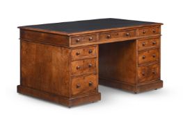 A VICTORIAN WALNUT PARTNER'S PEDESTAL DESK, IN THE MANNER OF HOLLAND & SONS, CIRCA 1860