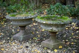 A PAIR OF STONE COMPOSITION VASES, IN THE MANNER OF J. M. BLASHFIELD, 20TH CENTURY