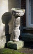 A CARVED OVAL STONE STOOP OR SHALLOW CISTERN, FRENCH OR ITALIAN, EARLY 18TH CENTURY