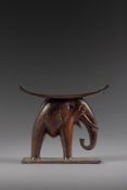 AN UNUSUAL ASHANTI WOOD STOOL, LATE 19TH/EARLY 20TH CENTURY