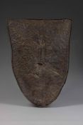 A WORKED LEATHER TRIBAL SHIELD, KENYAN
