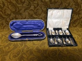 Cased silver teaspoons and love spoon