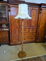 Polished beech standard lamp