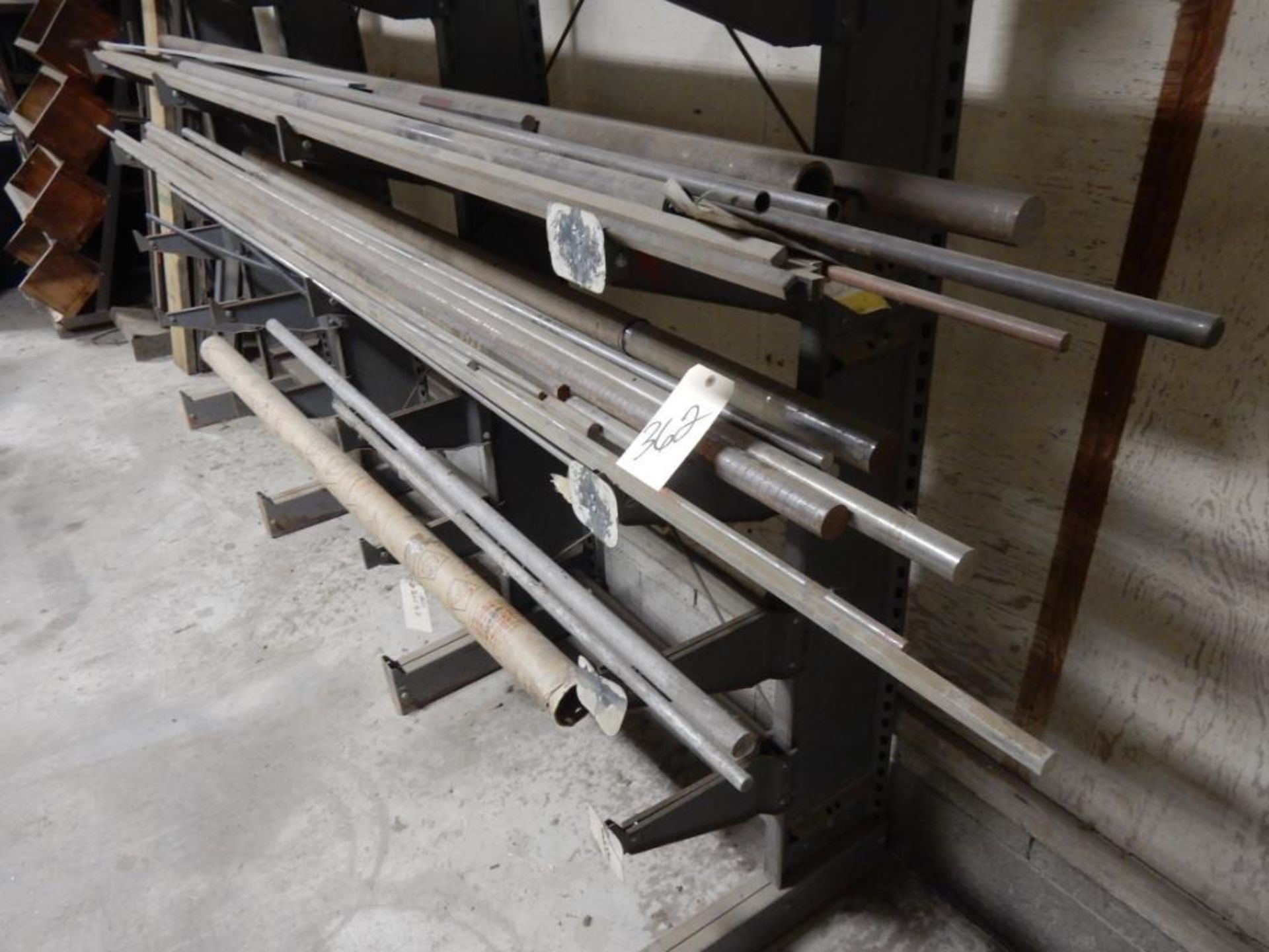 SINGLE SIDE CANTILEVER RACK W/REMAINING CONTENTS INCLUDING VERT RACK