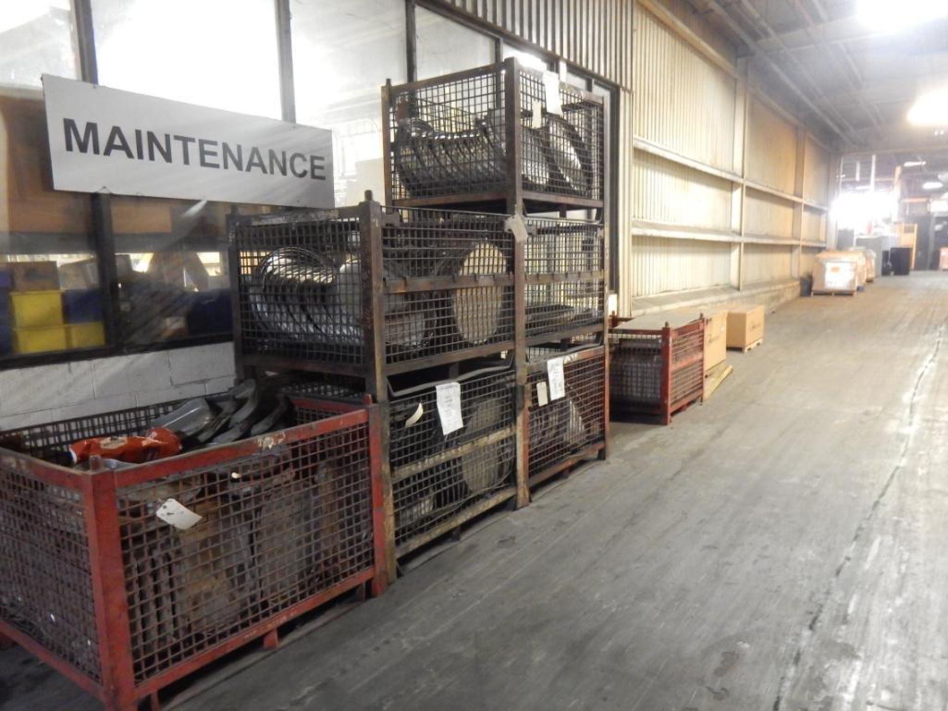 CONTENTS OF BREEZEWAY AREA OUTSIDE MAINTENANCE ROOM TO INCLUDE - (4) PALLET RACK SECTIONS, MISC. TAN