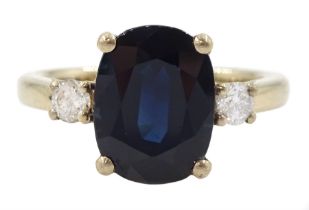 18ct gold three stone oval sapphire and round brilliant cut diamond ring