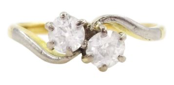 Early 20th century gold two stone old cut diamond crossover ring