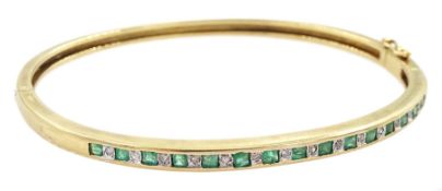 9ct gold channel set square cut emerald and diamond hinged bangle
