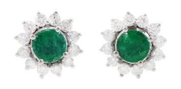 Pair of 18ct white gold emerald and round brilliant cut diamond cluster stud earrings