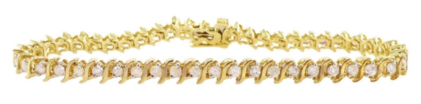 14ct gold round brilliant cut diamond 'S' link bracelet