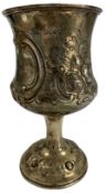 Victorian silver cup with embossed decoration on a domed pedestal foot H16cm London 1864 Maker Bear