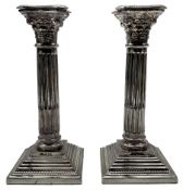Pair of silver Corinthian column table candlesticks on stepped square bases with beaded sconces H20c