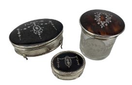 Early 20th century matched three-piece silver and tortoiseshell dressing table set comprising a glas