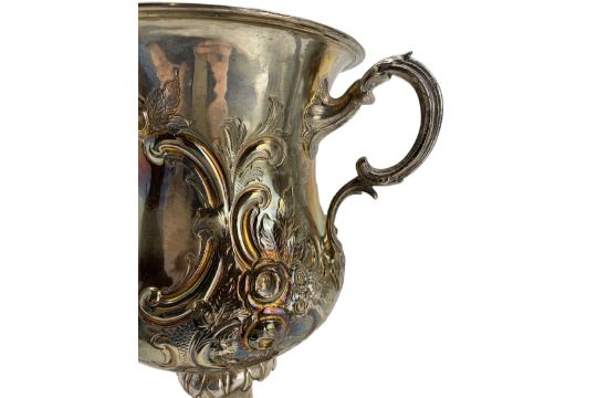 Large Victorian silver two handled cup with embossed floral decoration - Image 4 of 4